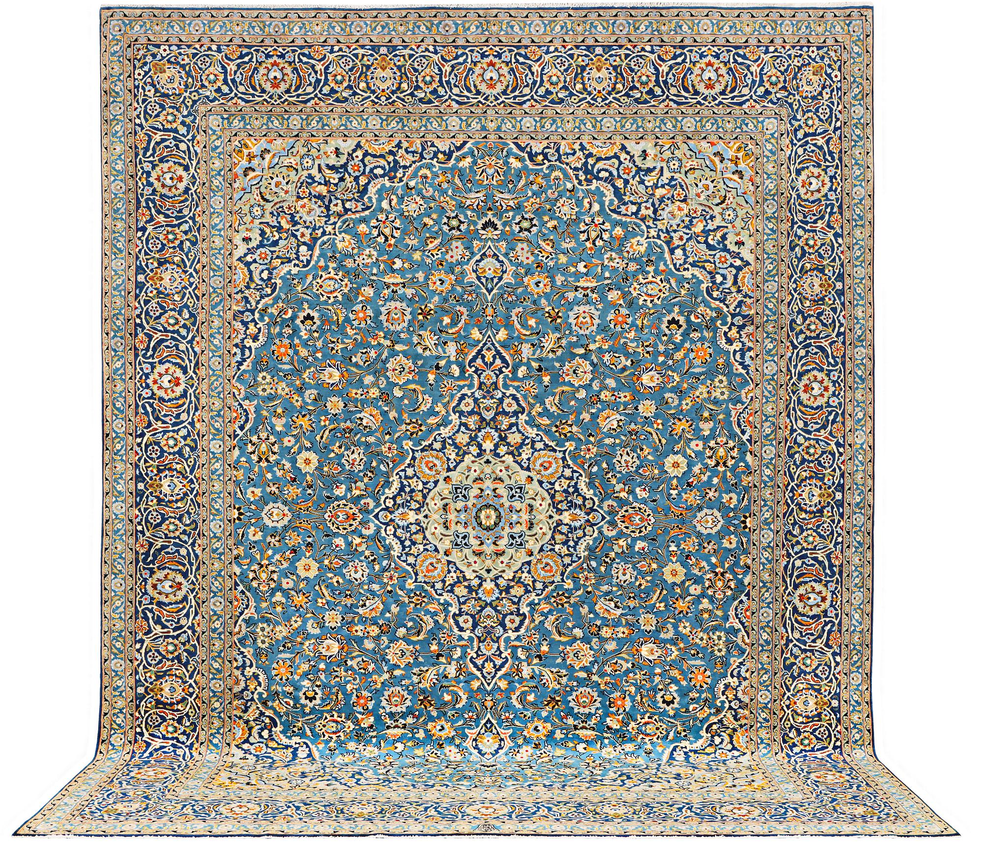 A Kashan carpet, signed Isfahanian, a. 407 x 310 cm.