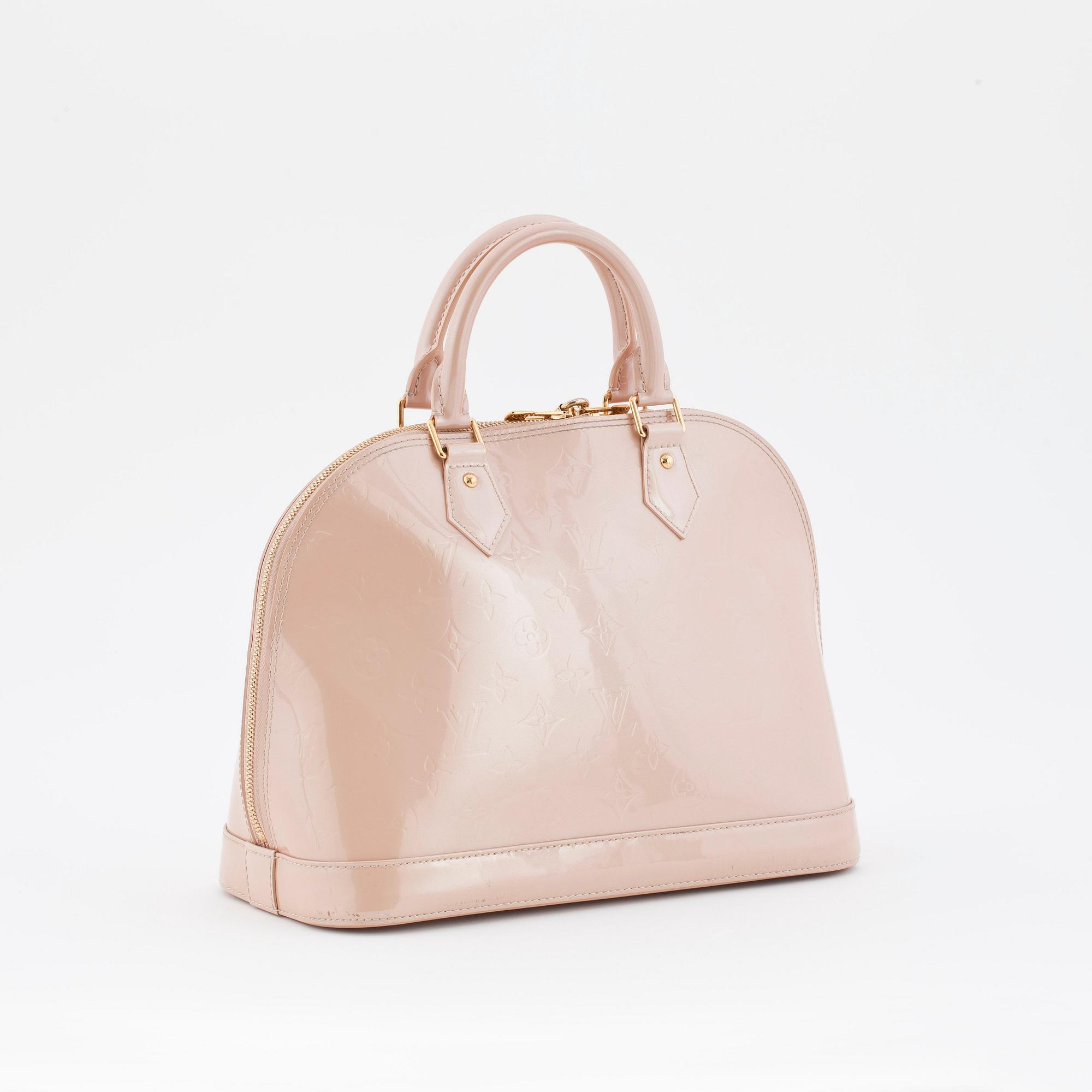LOUIS VUITTON, a powder beige monogrammed vernis top handle bag, "Alma".