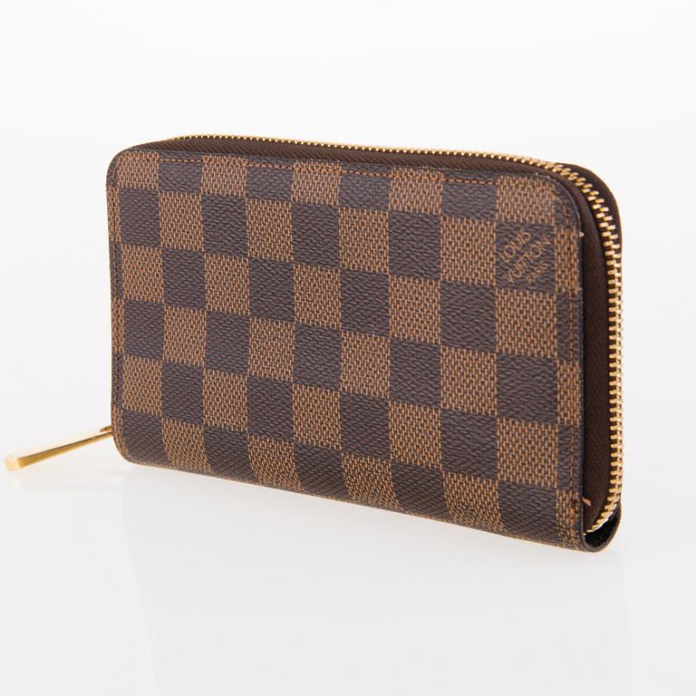 LOUIS VUITTON Damier Ebene Zippy Wallet.