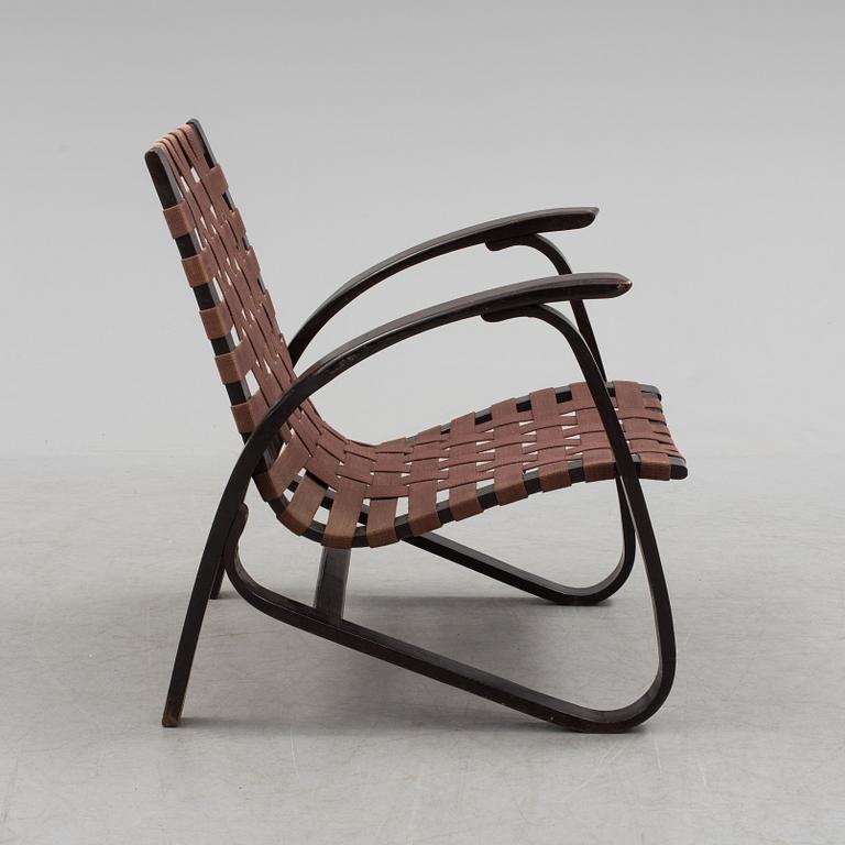 A 1930s easy chair by Jan Vanek.
