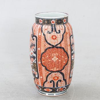 A Japanese porcelain Imari floor urn around  1900.