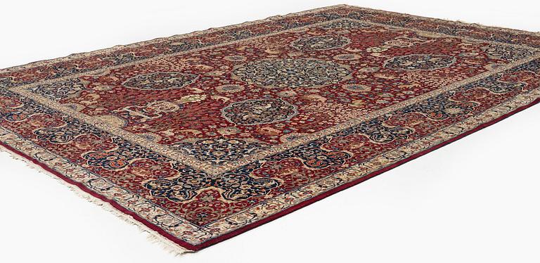 A semi-antique Benlian Tabriz carpet, signed Jabarzade, c. 416 x 308 cm.
