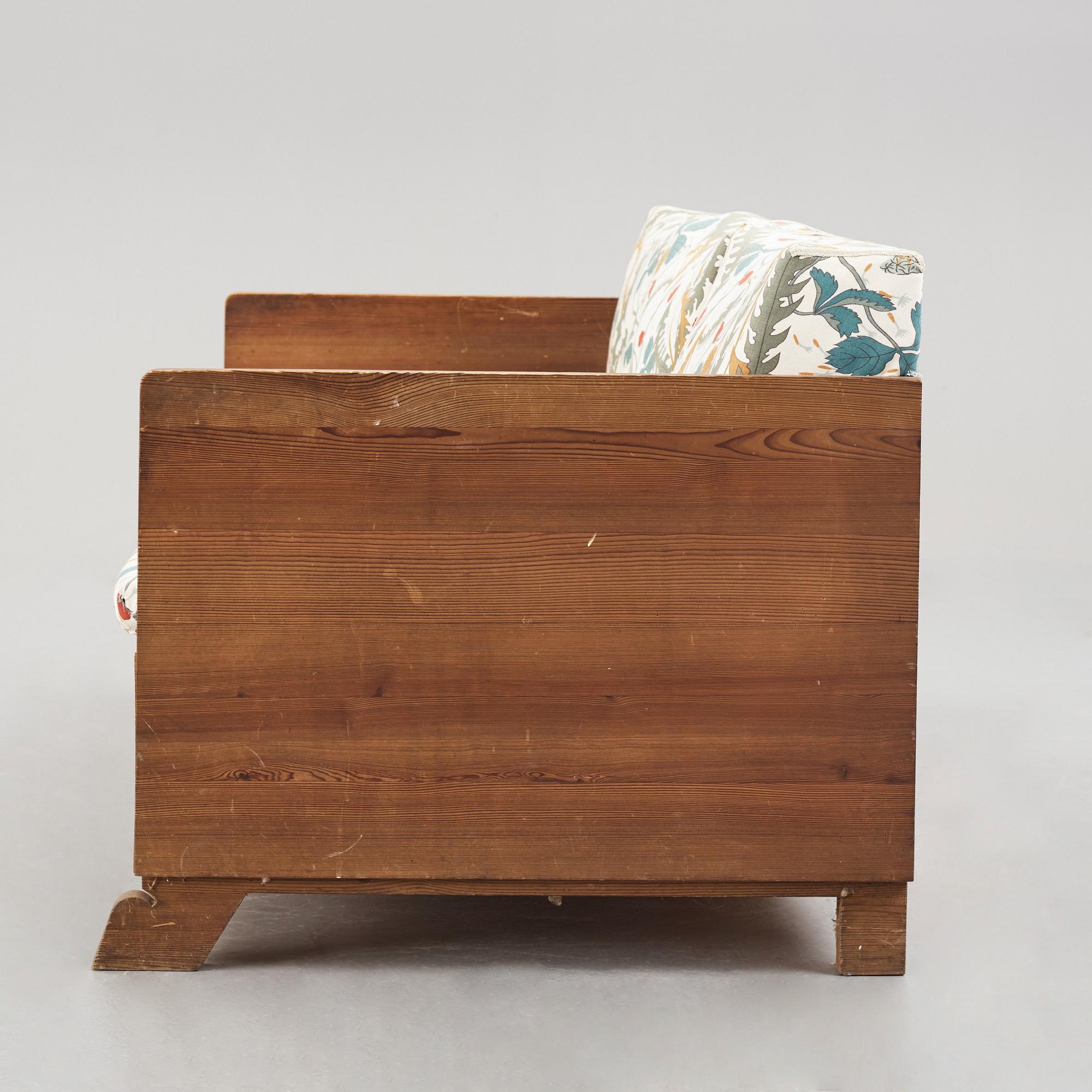 Axel Einar Hjorth, a stained pine sofa "Sport", Nordiska Kompaniet, Sweden 1930's.