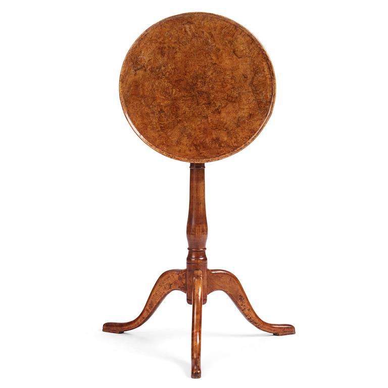 A burr-alder tilt-top table by J. Sjölin (master 1767-1785).