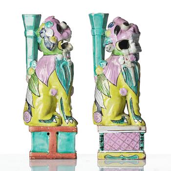 A pair of famille rose 'buddhist lion' joss stick holders, Qing dynasty, circa 1800.