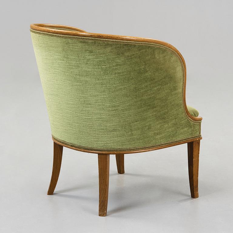 Axel Einar Hjorth, A 'Bellman' elm armchair, attributed to Axel Einar Hjorth, Nordiska Kompaniet, Sweden ca 1929.