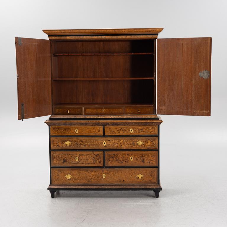 A burr alder, elm, and gilt-brass mounted late Baroque cabinet, first part of the 18th century.