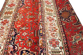 A Tabriz carpet, c. 335 x 257 cm.