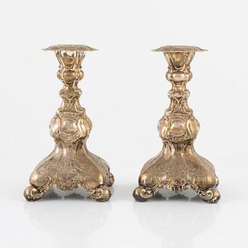 A pair of Swedish silver candlesticks, bearing the mark of GAB Stockholm, 1949.