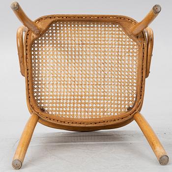 A matched pair of armchairs from Thonet, circa 1900 and late 20th Century.