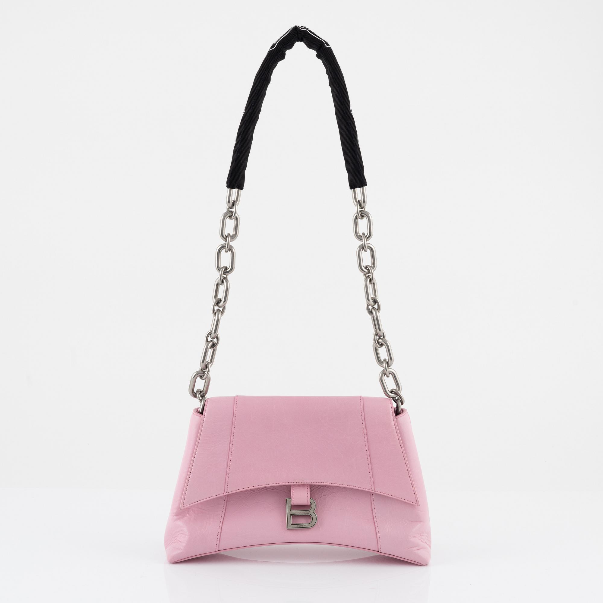 Balenciaga, a pink leather 'Downtown' bag.