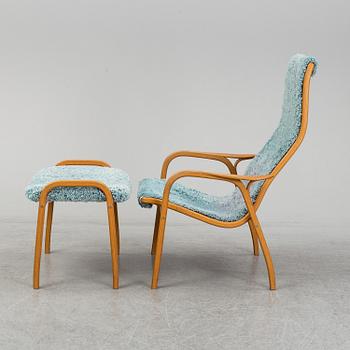 YNGVE EKSTRÖM, a 'Lamino' armchair with a stool, Swedese.