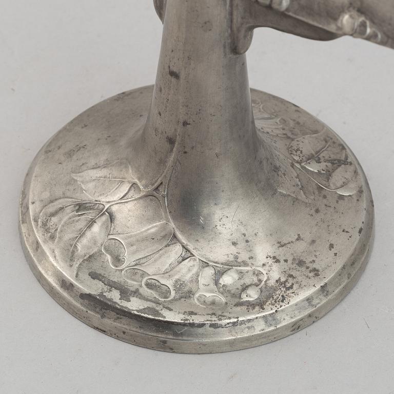 A Kayserzinn pewter vase and candelabrum, German, early 20th Century.