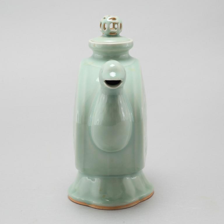 A celadon porcelain tea pot, China, modern manufactory.