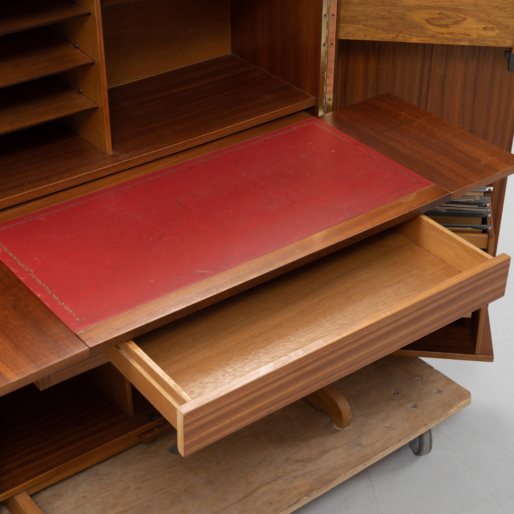 A teak veneered 'Home Office', Newcraft Ltd, England, second half of the 20th Century.