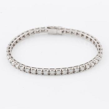 Tennis bracelet, 18K white gold with brilliant-cut diamonds.