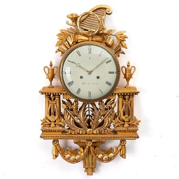 Wall-mounted clock, gilt, dial signed Wilhelm Pauli, Stockholm (active 1795–1816).