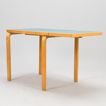 ALVAR AALTO, A mid-20th century drop leaf table for Artek Finland.