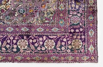 An antique silk Kashan rug, Central Persia, c. 207 x 131 cm.