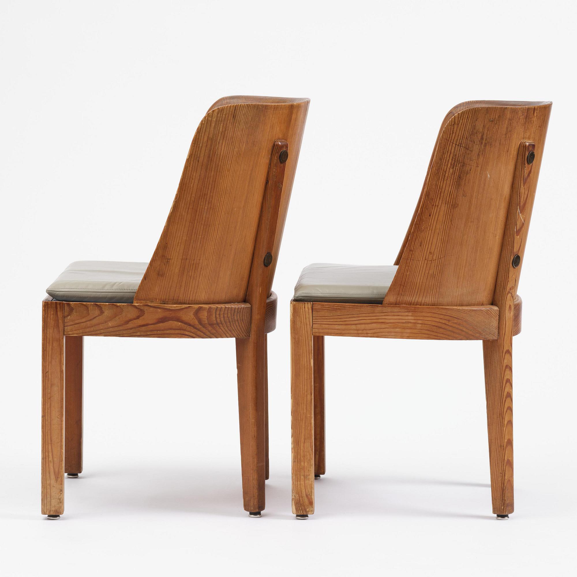 Axel Einar Hjorth, a pair of stained pine "Lovö" armchairs, Nordiska Kompaniet, Sweden, 1930s.
