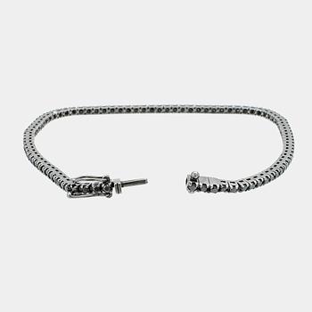 Lanza Carlo, tennis bracelet in 18K blackened white gold with round brilliant-cut black diamonds, Italy.