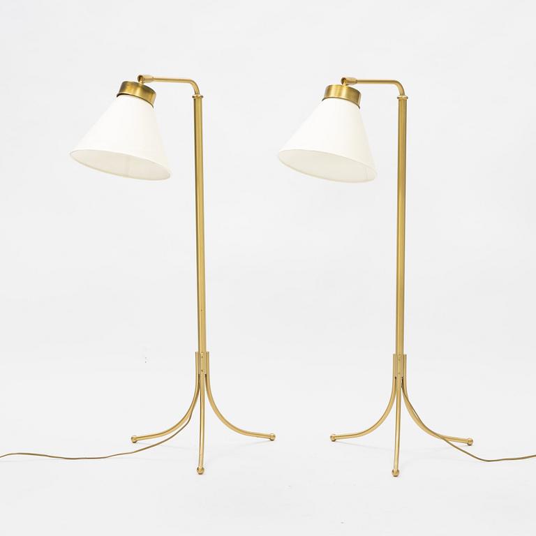 Josef Frank, a pair of model 1842 brass floor light, Svenskt Tenn.