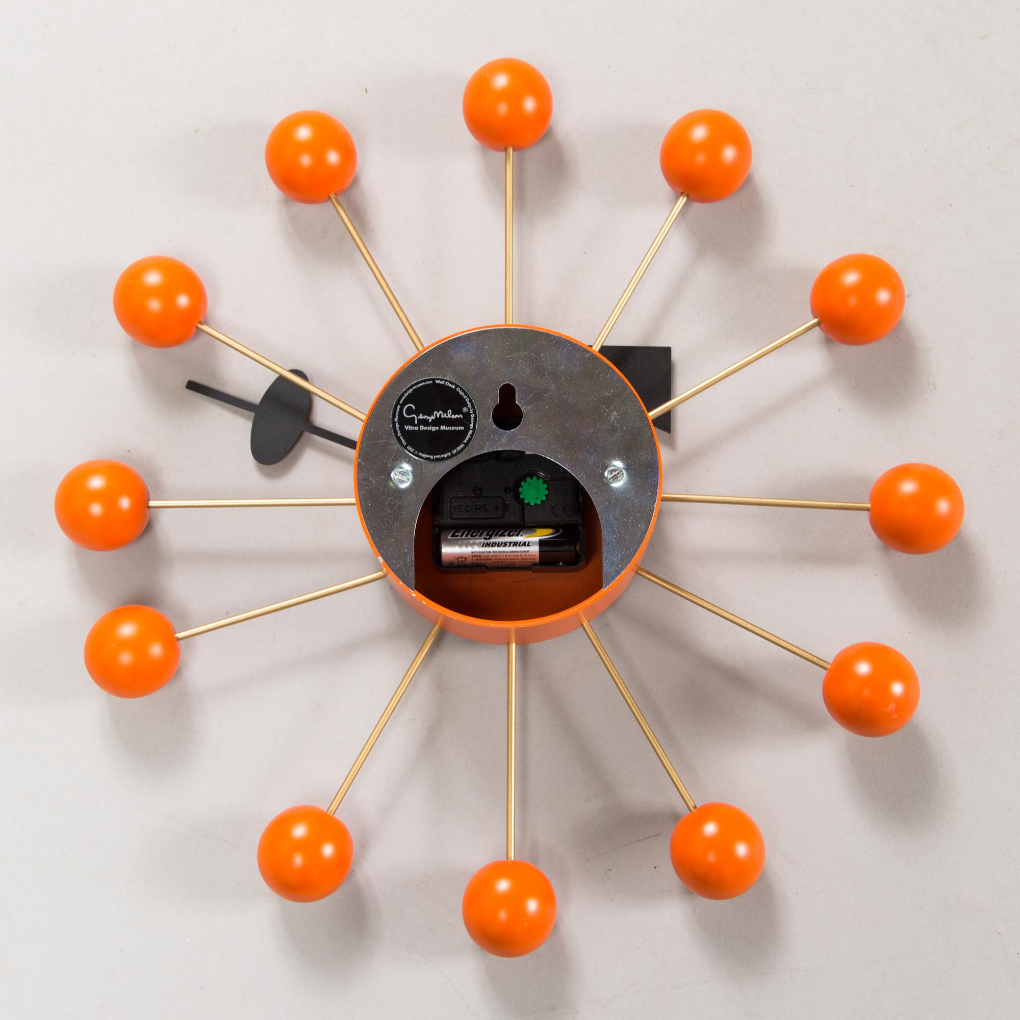 George Nelson, seinäkello, "Ball Clock", Vitra Design Museum, 2000-luku.