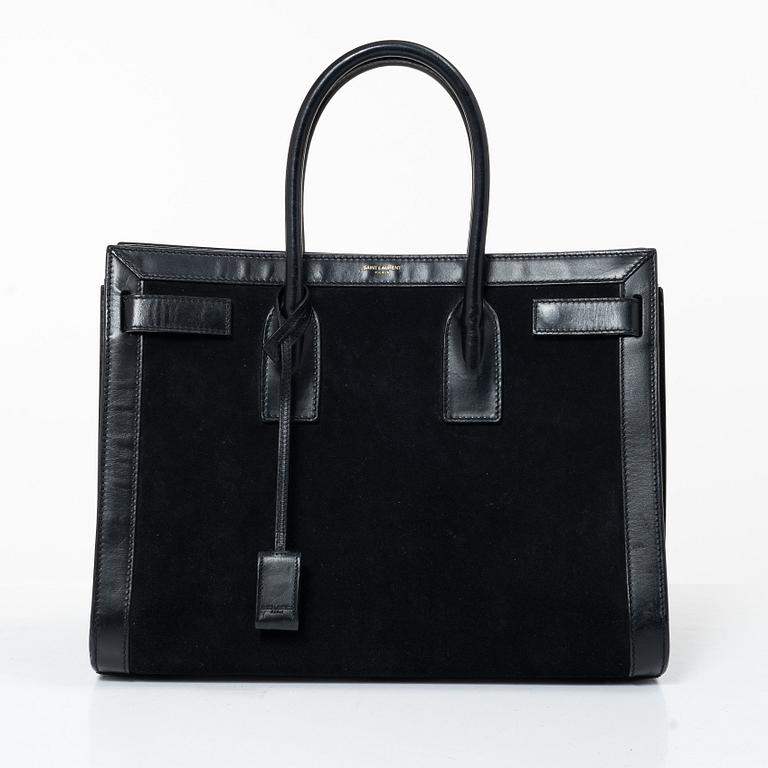 Yves Saint Laurent, a 'Sac du Jour' handbag.