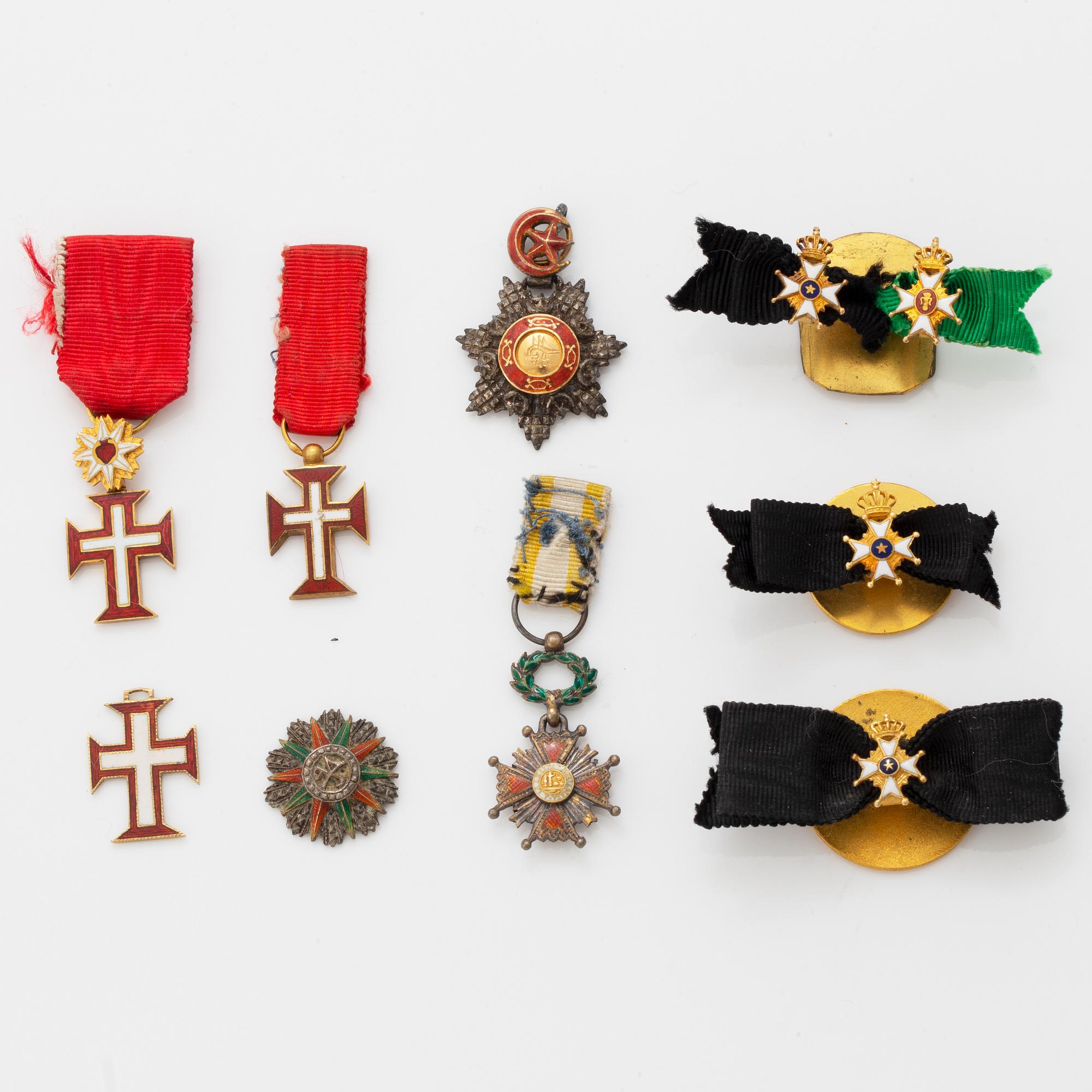 A group of miniature decorations, mostly Swedish.