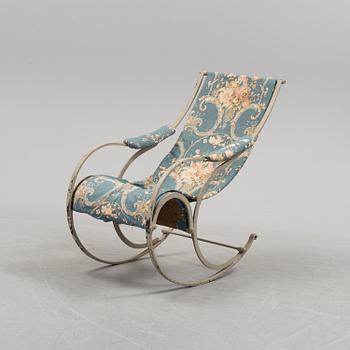 An iron rocking chair, 19th century.