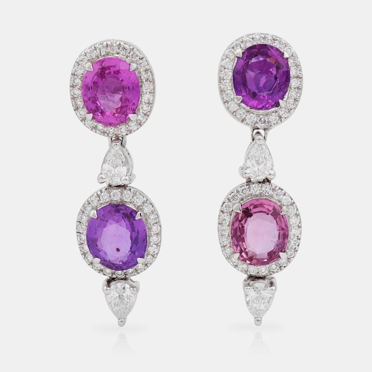 A pair of 6.63 ct pink sapphire and 1.32 ct pear and brilliant-cut diamond earrings.