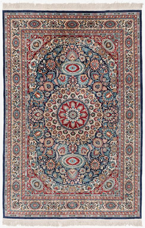An oriental silk rug. c. 274 x 180 cm .