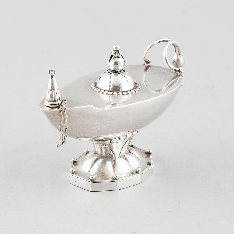 A sterling silver table lighter / oil lamp by Georg Jensen, design nr 12, Copenhagen 1925-32.