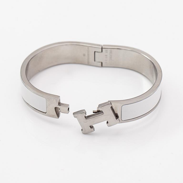 Hermès, armband, "Clic H PM", silverfärgad metall och vit emalj.