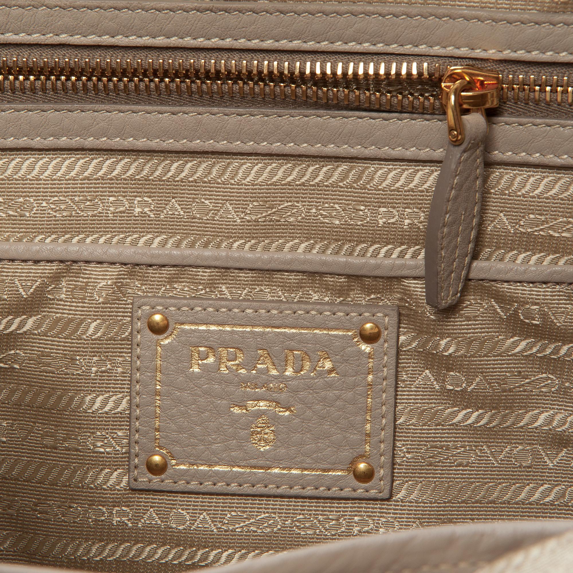 A leather handbag by Prada.