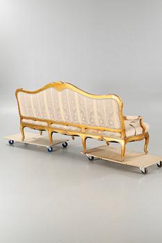 A rococo sofa from the first half of the 20th century.