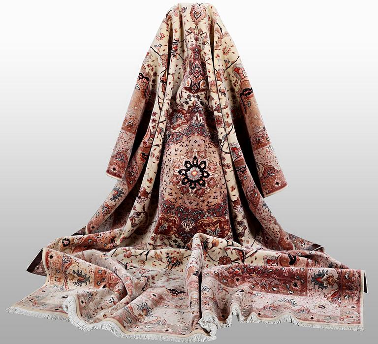 A carpet, Tabriz, part silk, 50 Raj, ca 340 x 253 cm.
