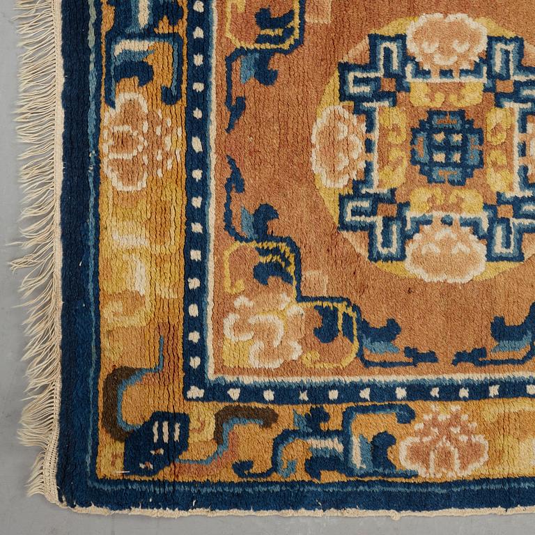 A meditation rug, a semi-antique Ningxia, China, ca 122 x 60-61 cm (as well as ca 0,5 cm later flat weave at one end).