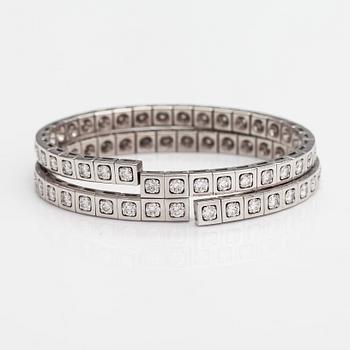 Cartier, Rannekoru "Tectonique", 18K valkokultaa, briljanttihiottuja timantteja n. 11.90 ct yht. Merkitty CT6808, JC.