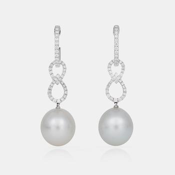 710. A pair of cultured South Sea pearl and brilliant-cut diamond earrings.