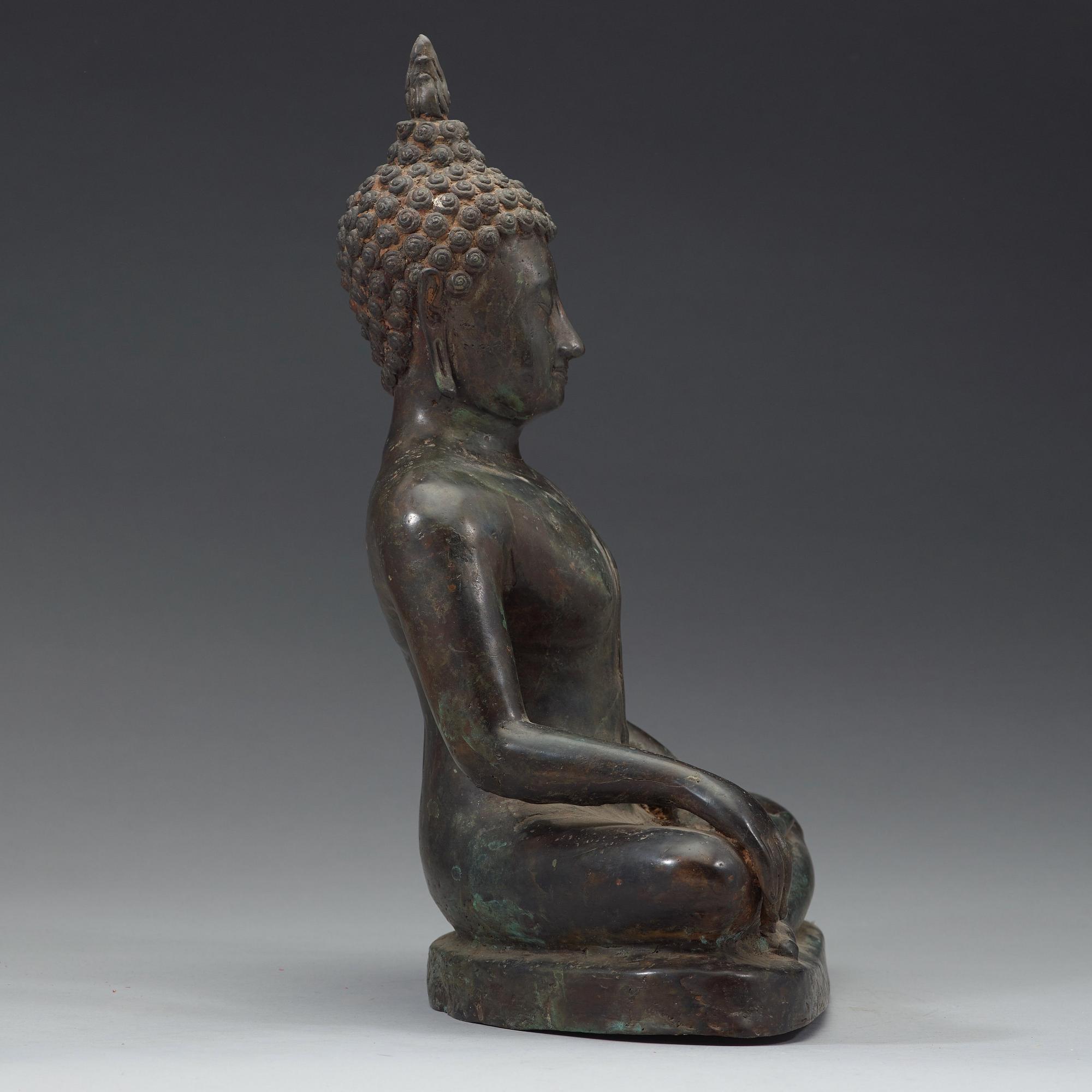 A seated bronze Buddha, Thailand, presumably Lanna, 15th/16th Century.