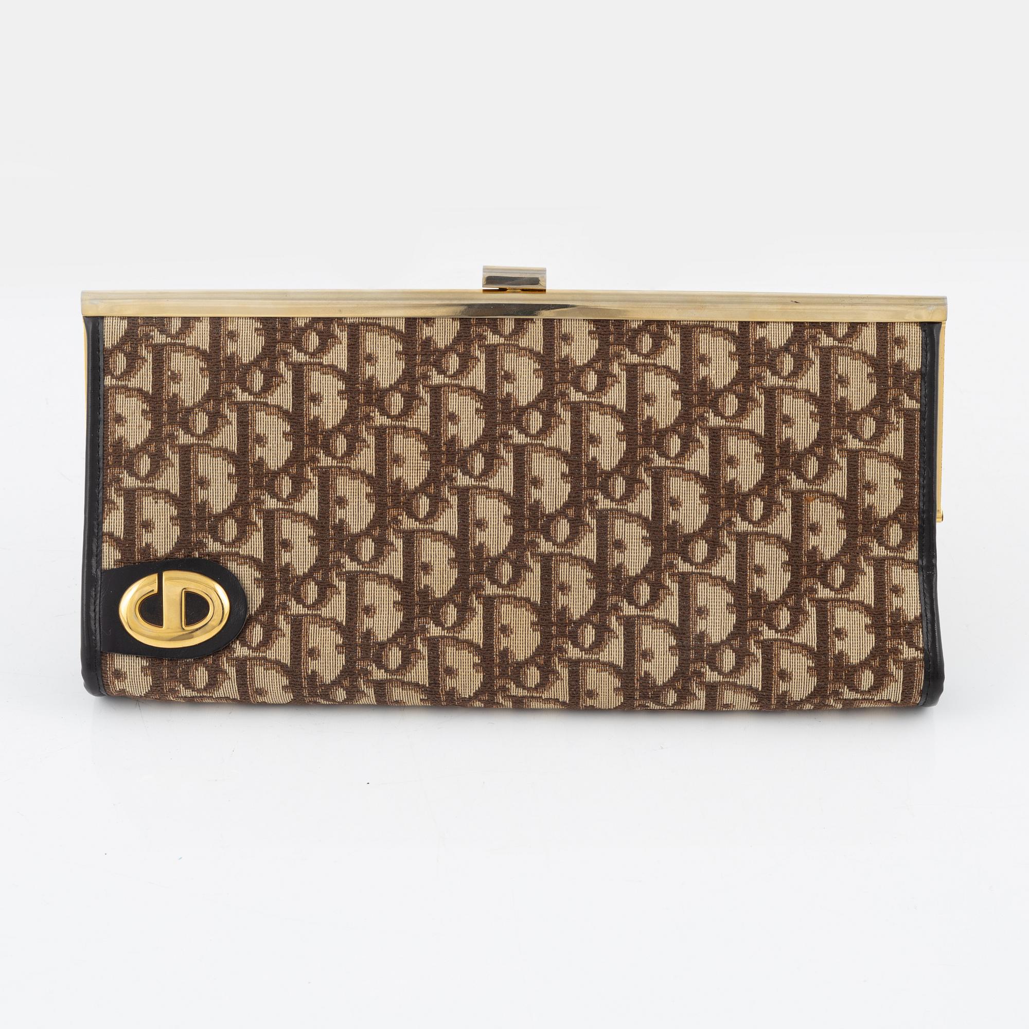 Christian Dior, a canvas clutch.