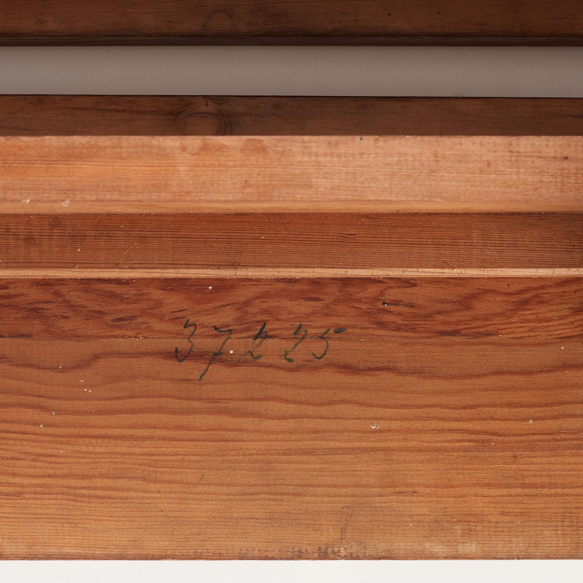 Axel Einar Hjorth, two stained pine "Skoga" stools, Nordiska Kompaniet, Sweden 1930's.