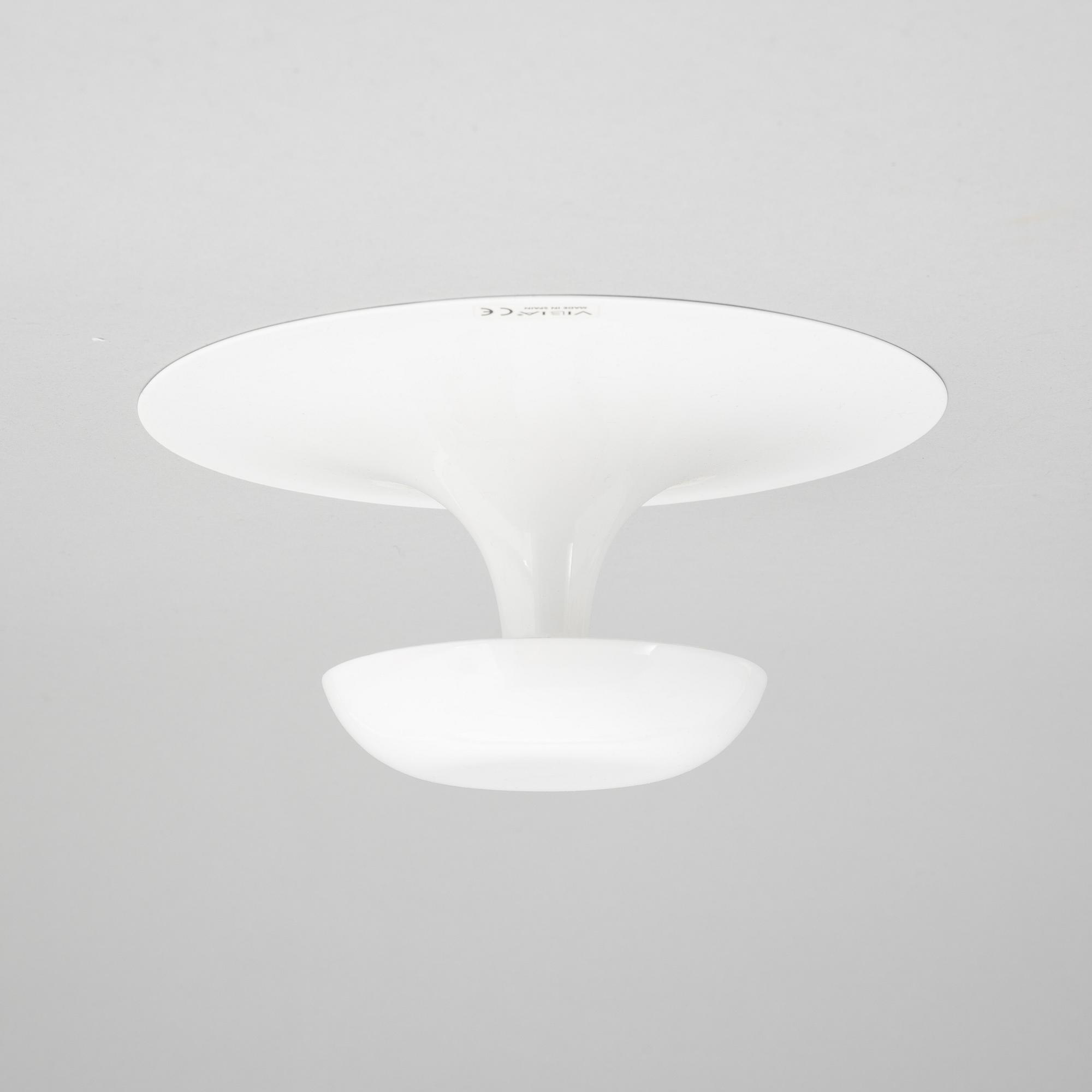 A set of four wall lamps from Vibia, Spain, 21st Century.