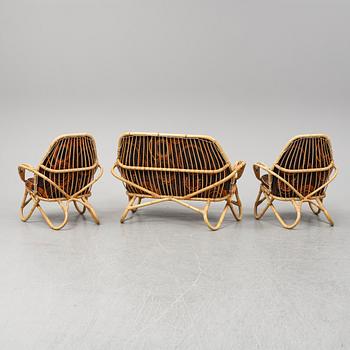 A sofa and two easy chairs, 1960s.