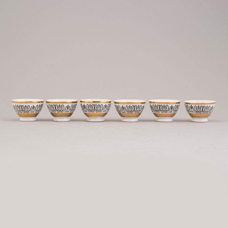 PIERO FORNASETTI, 6 bowls and 6 small plates "Astrolabio".