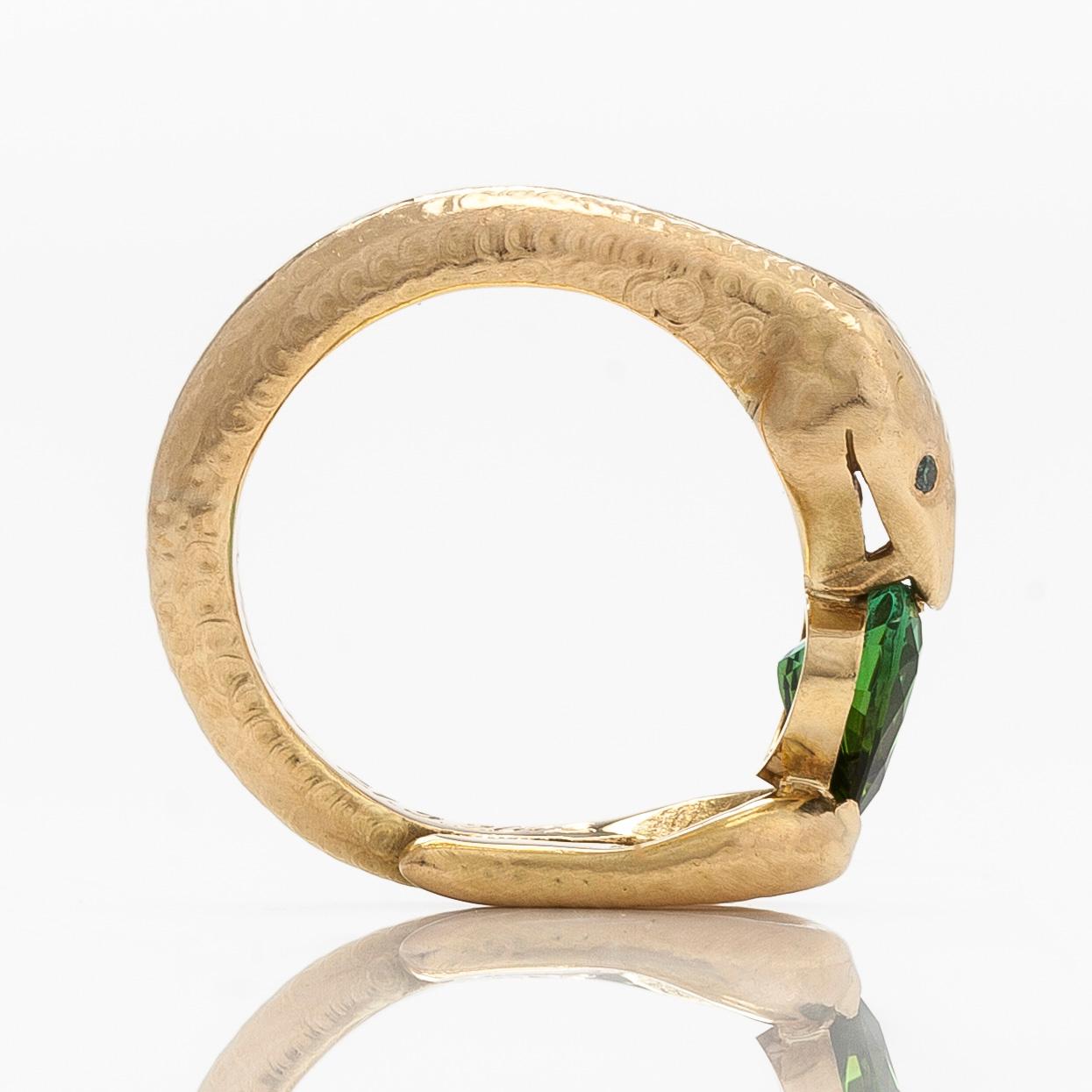 Torbjörn Tillander, an 18K gold serpent ring with heart-shaped green tourmaline and green diamonds, Helsinki 2011.