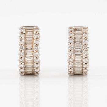Earrings, a pair, 18K white gold set with baguette and brilliant-cut diamonds.