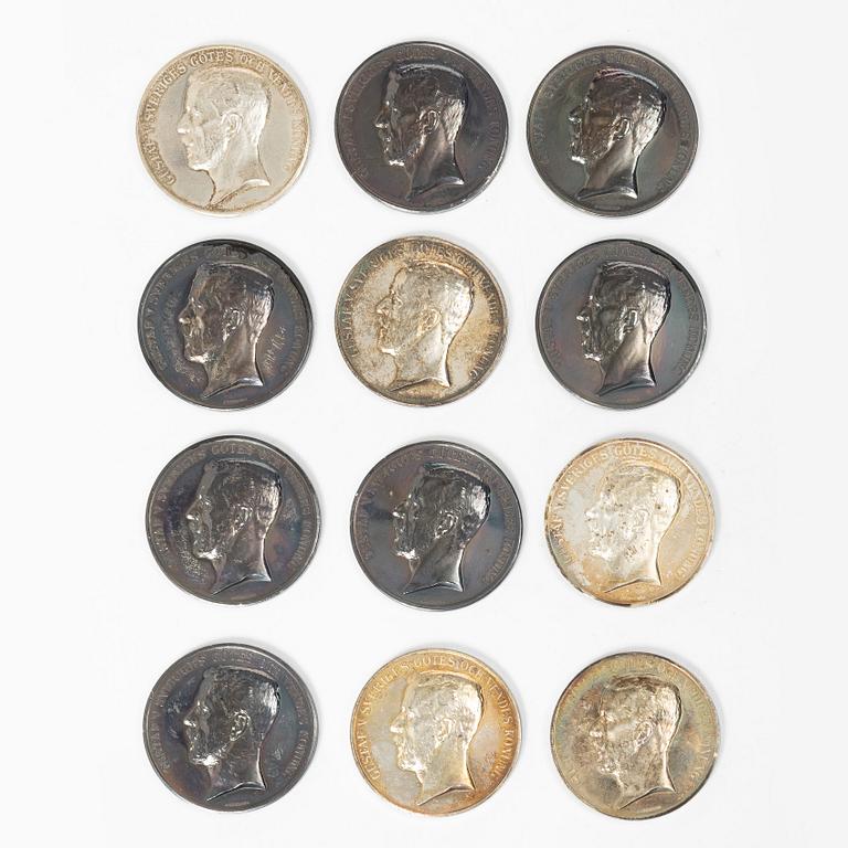 Twelve silver medals, Kungliga Myntverket, Sweden, early 20th century.