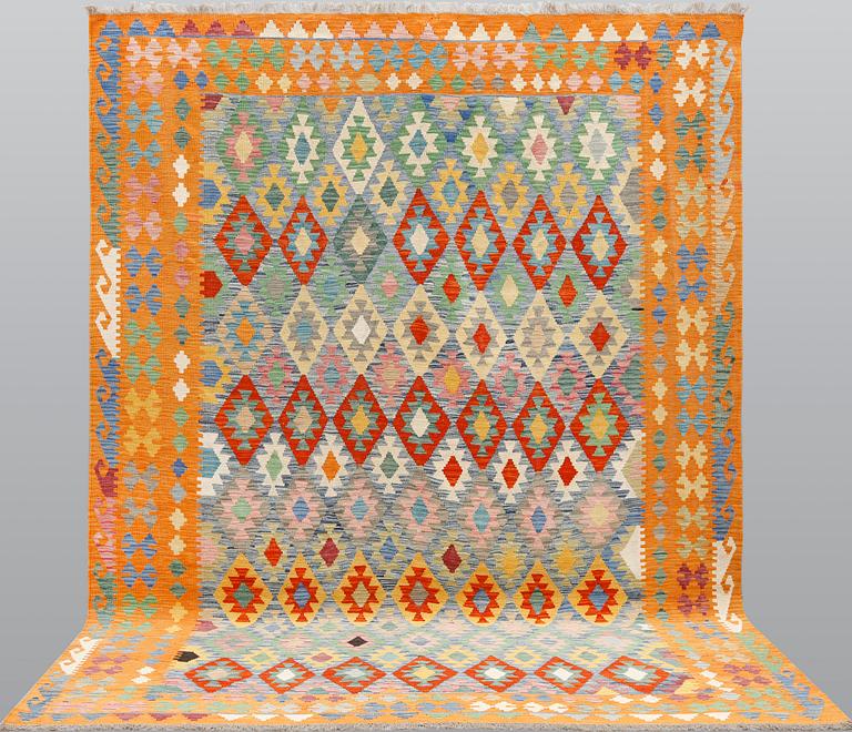 A kilim carpet, ca 342 x 256 cm.